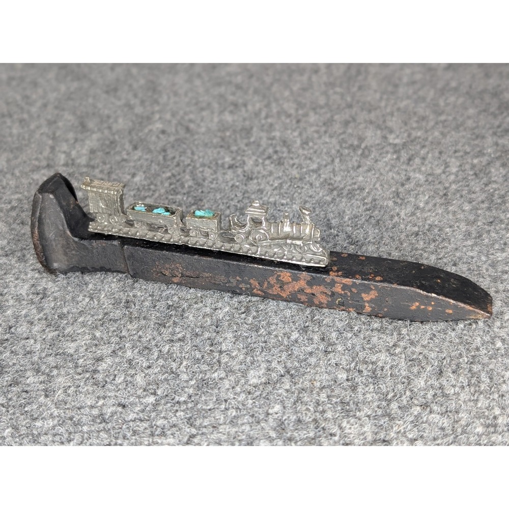 Railroad Spike With Silver Model Train On Top Hauling Topaz 7" Long - Picture 1 of 8